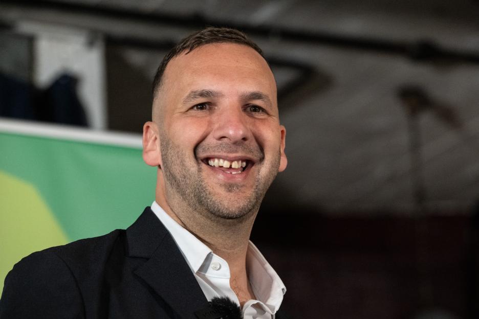Green Party leader Zack Polanski speaking at a press conference.
