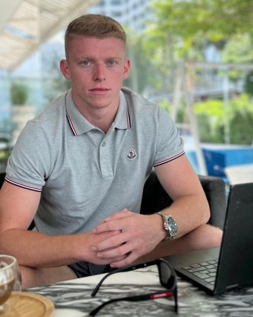 Tom Roberts, now 24, poses for a photo.