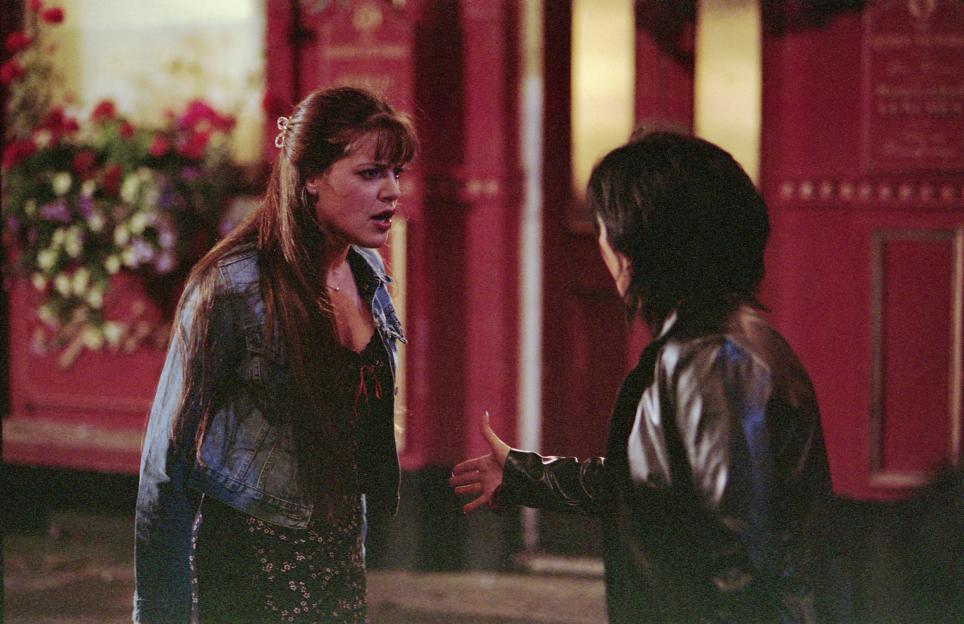 Michelle Ryan as Zoe Slater and Jessie Wallace as Kat Slater in a scene from EastEnders, Zoe shouting and Kat reaching out.