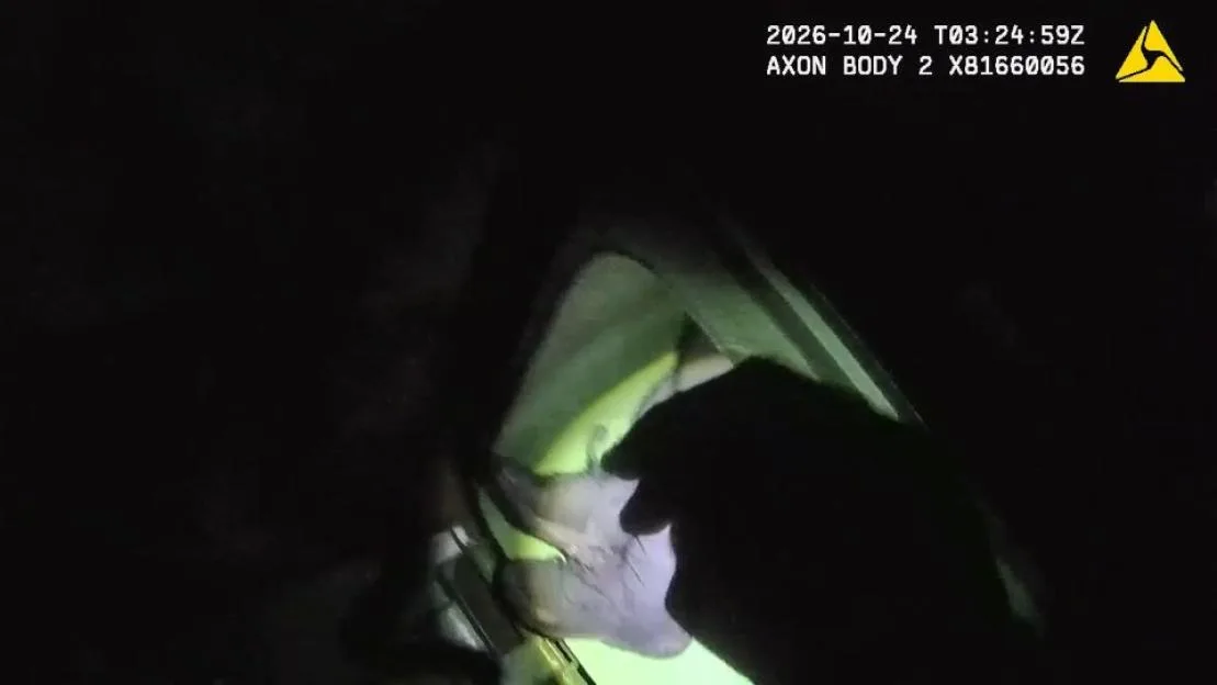 Police body-worn footage of a teenage boy hiding inside a green wheelie bin.