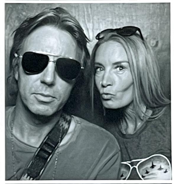 Photo booth image of Kayti Edwards and Elijah Blue Allman.