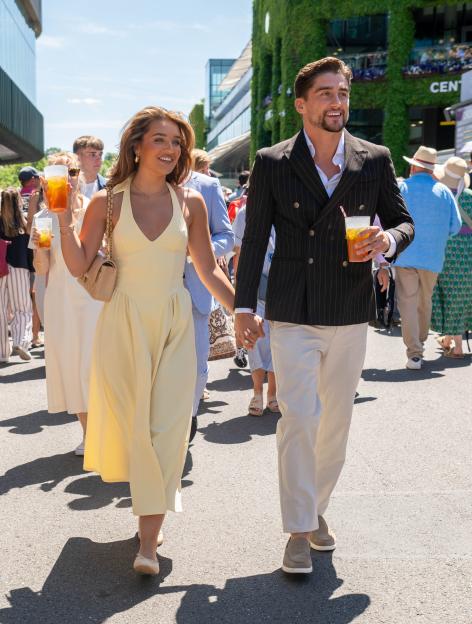 Lucinda Strafford and Sean Stone attending Wimbledon.