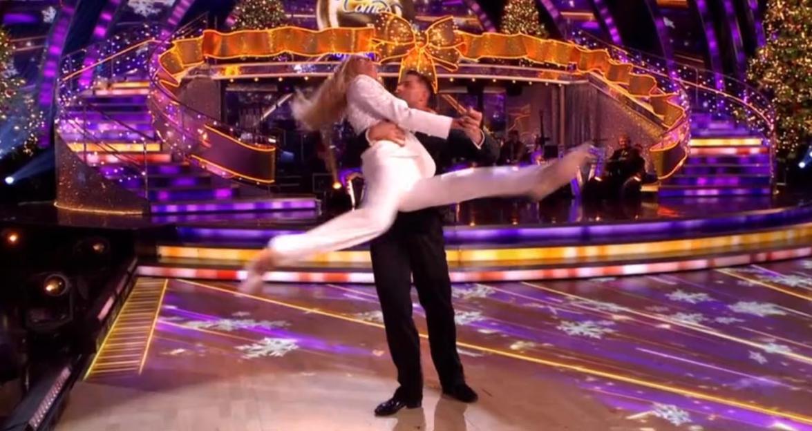 Tess Daly performs a lift with professional dancer Aljaz Skorjanec on the set of the Strictly Christmas special.
