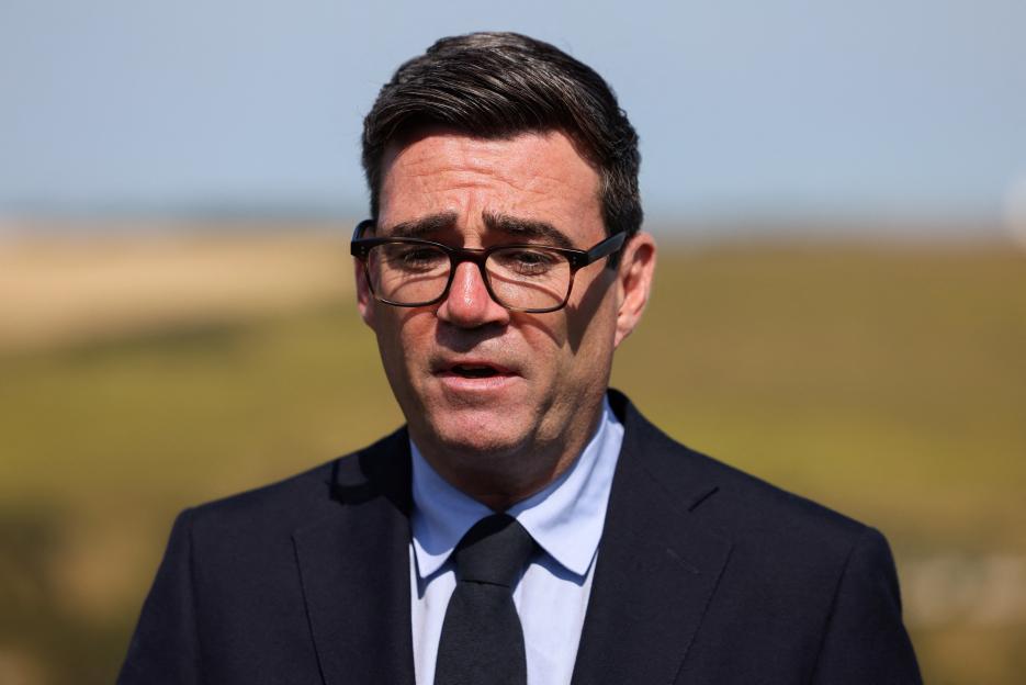 Britain's Prime Minister Andy Burnham speaks to the media.