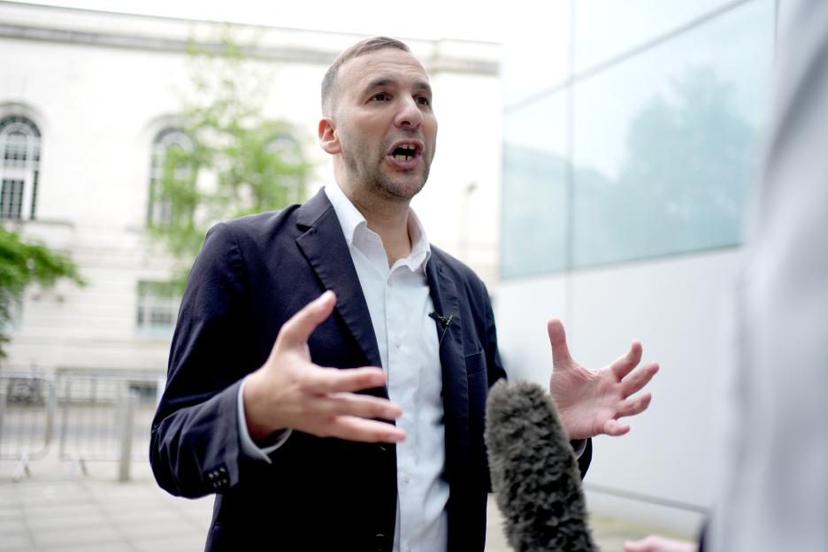 Green Party leader Zack Polanski speaks to the media outside the Hackney Service Centre.