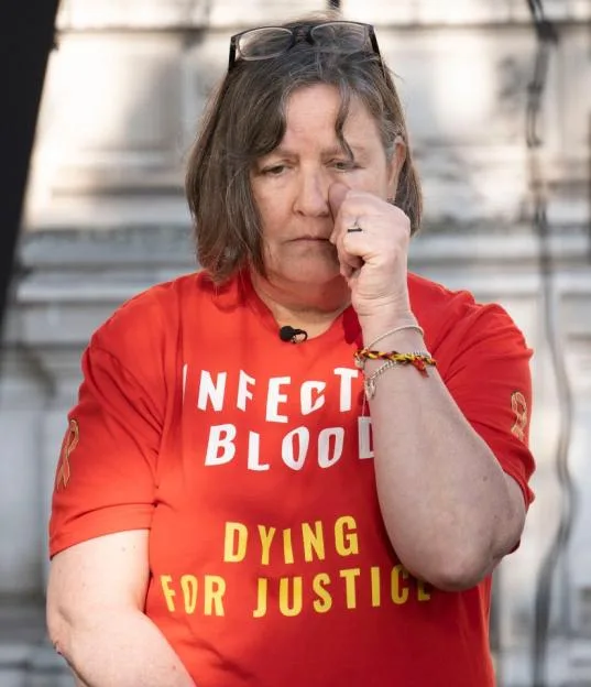 Jackie Britton, who contracted Hepatitis C, speaks outside the Infected Blood Inquiry in Westminster, London.