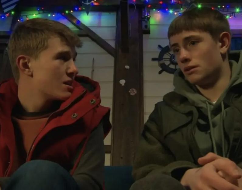 Alfie Clarke with another person, possibly a co-star from Emmerdale.