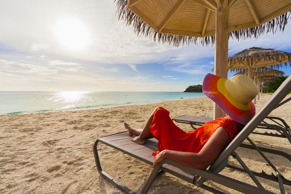 Outrage as Benefit Fraudsters Pocket £4.3 Million Weekly While Sunbathing Abroad!