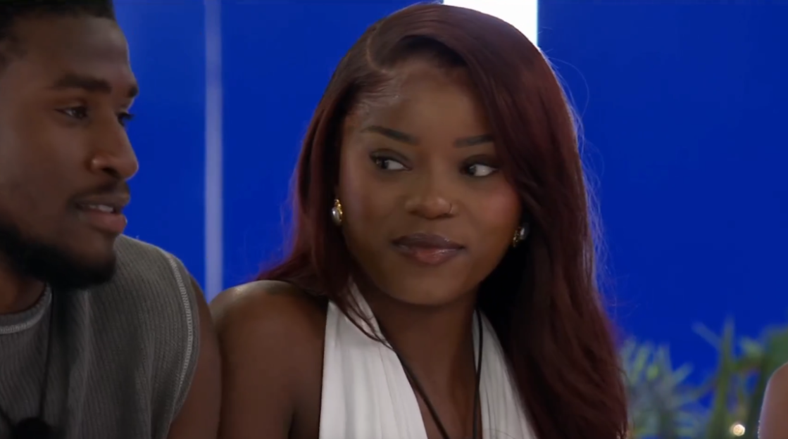 Mica and Simba from Love Island looking at each other.