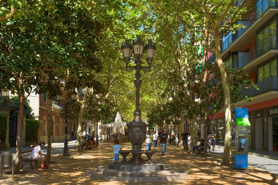 HOSPITALET DE LLOBREGAT, SPAIN - SEPTEMBER 2, 2017: A view of the Rambla Just Oliveras promenade in Hospitalet de Llobregat, Spain, the main pedestria