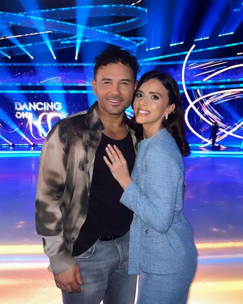 Lucy Mecklenburgh and Ryan Thomas posing at Dancing on Ice.