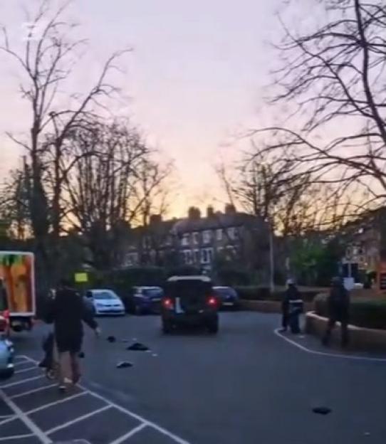A Land Rover collides with a machete-wielding thief in a Sainsbury's car park.