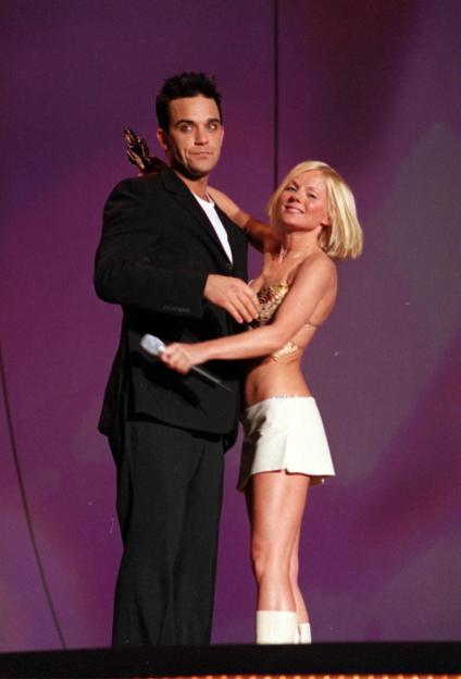 Robbie Williams and Geri Halliwell on stage at the Brit Awards.