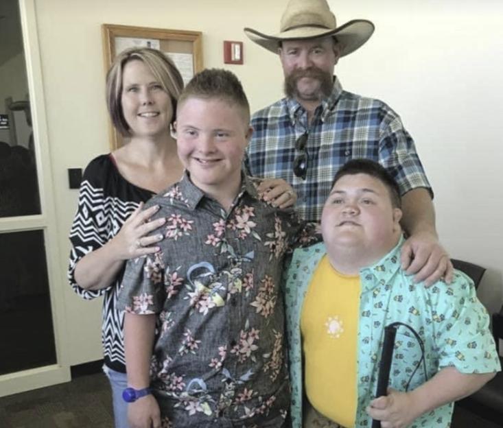 Shannon and Troy Pinkerton with their adopted sons Joey and Devlin.