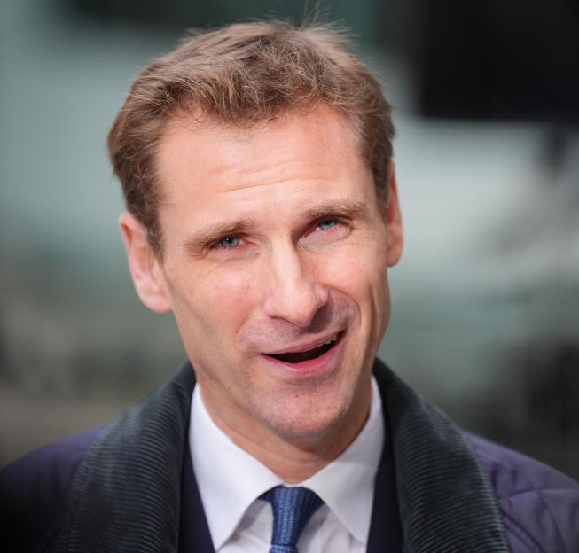 Shadow Home Secretary Chris Philp speaking to the media.