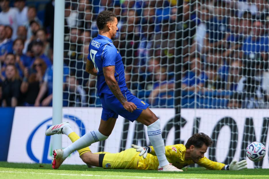 Morgan Rogers of Chelsea scoring a goal during a football match.