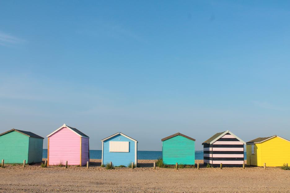 Colorful beach huts on the seafront
