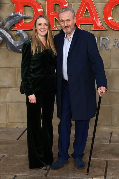 Emily Head and Anthony Head posing at a movie premiere.