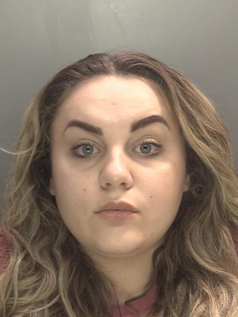 Mugshot of Gabriele Trinkunaite, a young woman with wavy light brown hair.