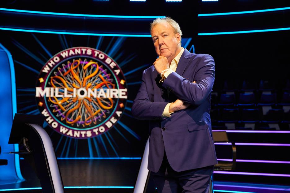 Jeremy Clarkson stands on the Who Wants to Be a Millionaire set.