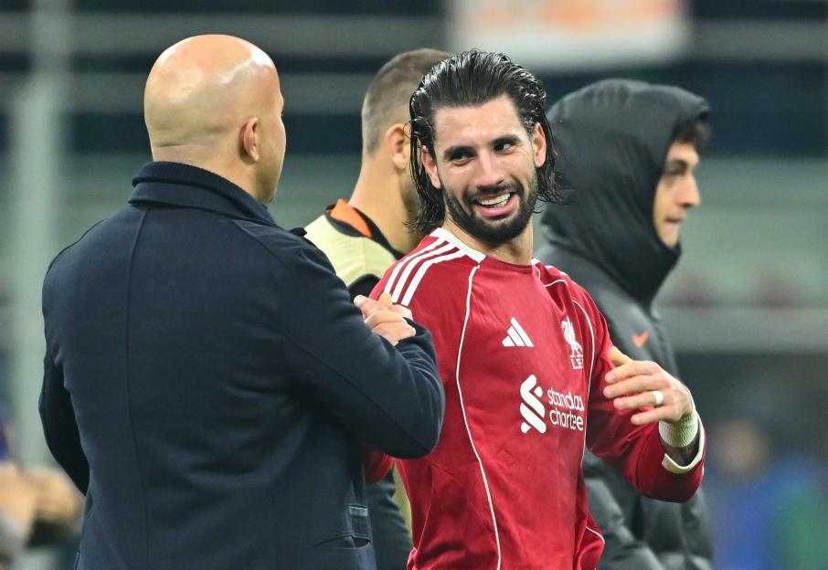 Liverpool FC's Dominik Szoboszlai being recognized by coach Arne Slot.