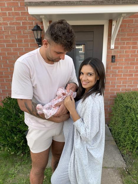 Charlotte Lescott, 31, with her partner Ali Watson, 28 and their daughter Soulie.