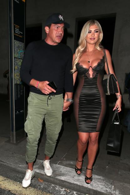 Ant Middleton and Megan Barton-Hanson holding hands on a street.