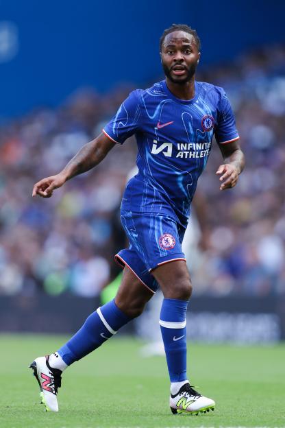 Chelsea FC footballer Raheem Sterling in a blue and white uniform.