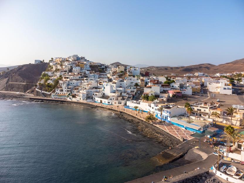 Aerial view of the beach and the coastal town of Las Playitas on the island of Fuerteventura.