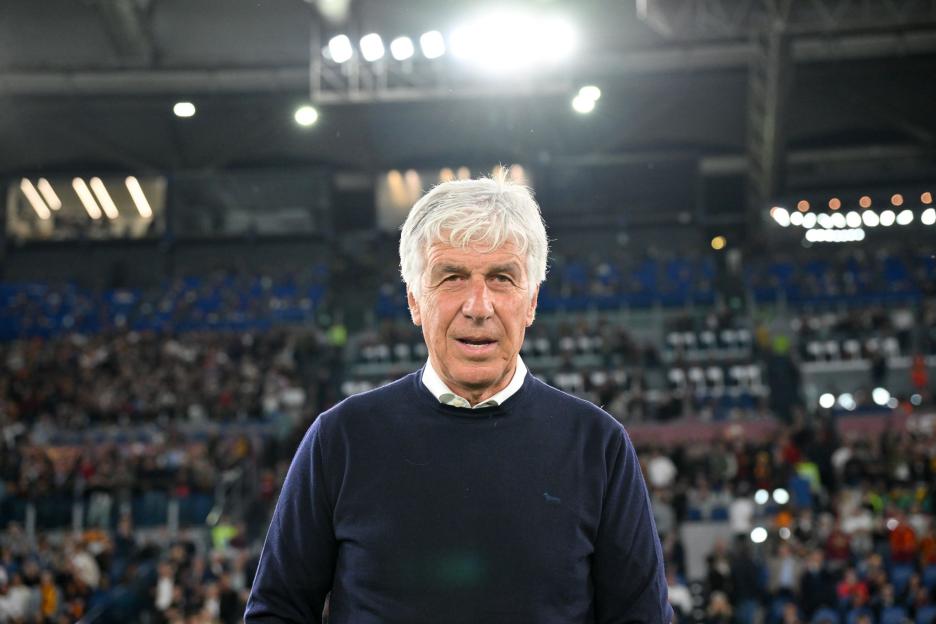 Gian Piero Gasperini, coach of Atalanta, looks directly ahead from the field during a football match.