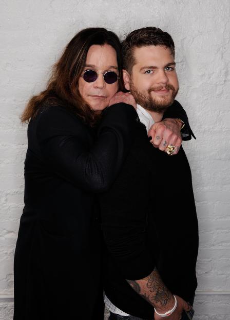 Ozzy Osbourne with his arm around his son, Jack Osbourne.