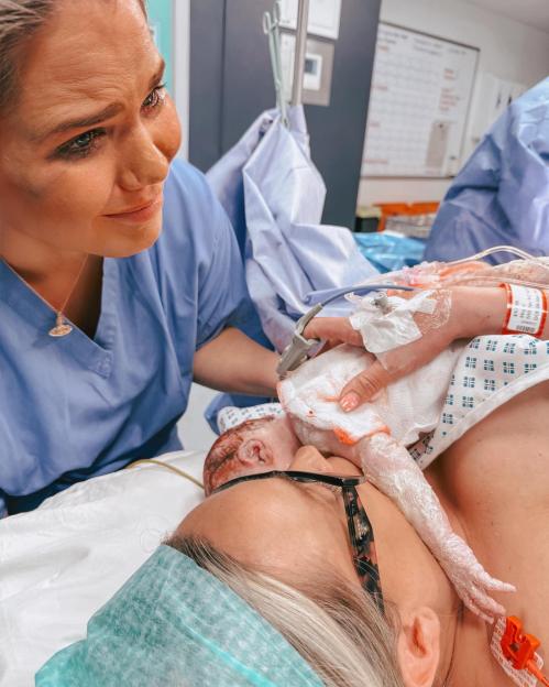 Married lesbians mistaken for twins welcome first child together.