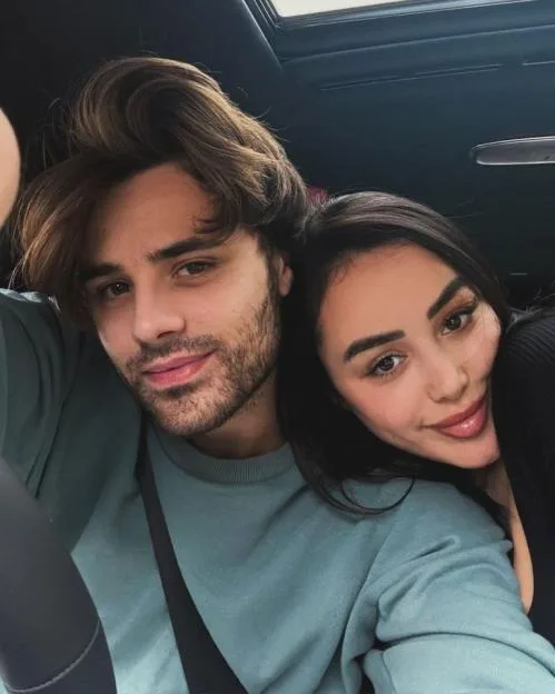 Marnie and Casey Johnson taking a selfie in a car.