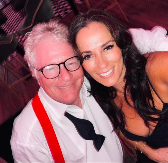 Jim Davidson, 70, with his fiancée Natasha, 47, at a showbiz party.