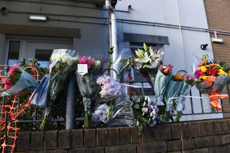 Floral tributes placed at the scene of the crash.