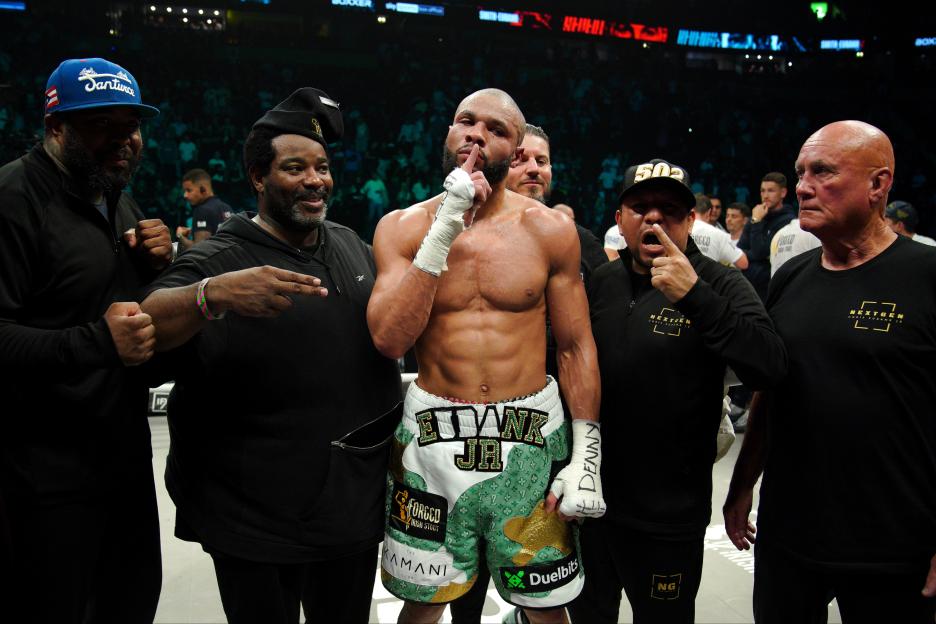 Chris Eubank Jr (center) with trainer Brian McIntyre (second left) after victory against Liam Smith via technical knockout in the Middleweight Title bout.