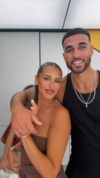 Caprice Alexandra and Shea Mannings smiling at the camera.