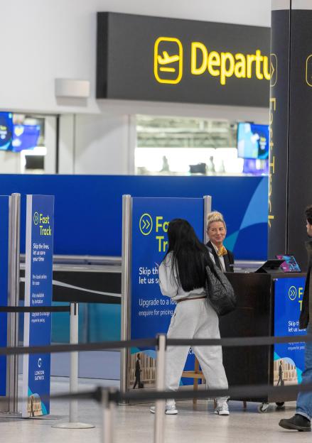 Excl - Katie Price has been spotted at Gatwick Airports North Terminal, checking in business class for a swanky Emirates flight to Dubai ? despite frantic pleas from those closest to her..Pals tell The Sun that friends and family have been desperatel