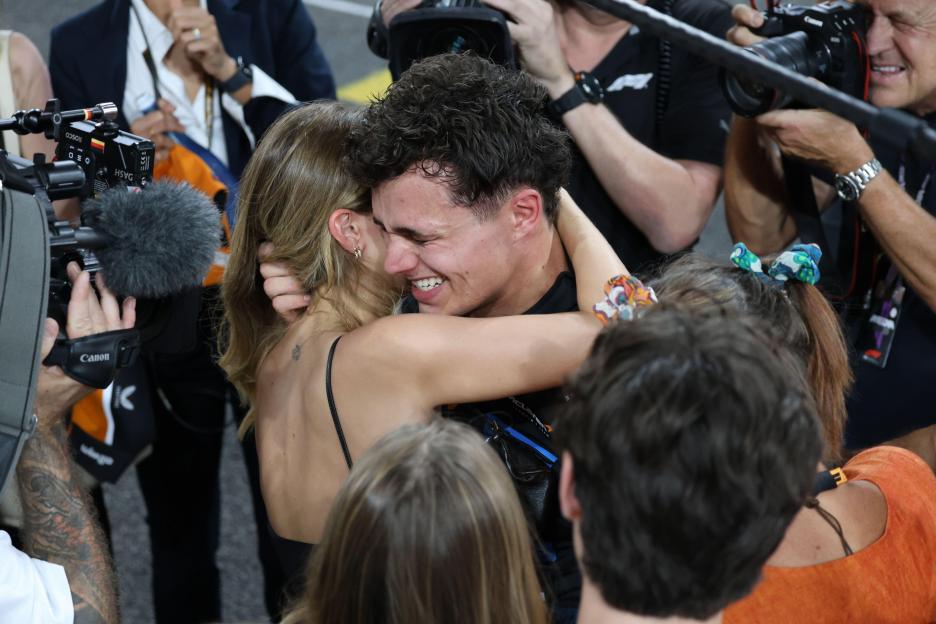 Abu Dhabi, United Arab Emirates. 7th Dec, 2025. F1 World Drivers Champion and Third placed Lando Norris of McLaren celebrates with his girlfriend Margarida Corceiro after Formula 1 Abu Dhabi Grand Prix at Yas Marina Circuit on December 7th, 2025 in A
