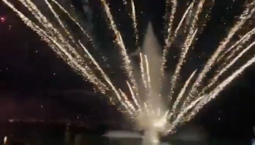 Fireworks shooting wildly into the air.
