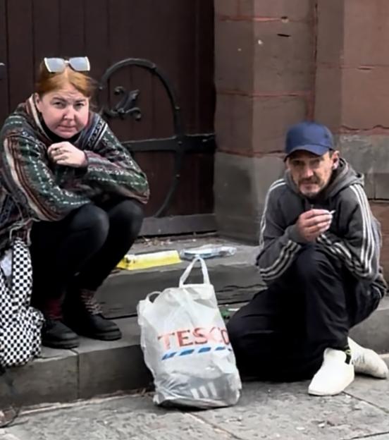 Rebecca Williams and Michael Burns outside court.